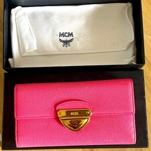 Authentic MCM used good condition pink long wallet.